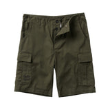 Front of dark green cargo shorts.
